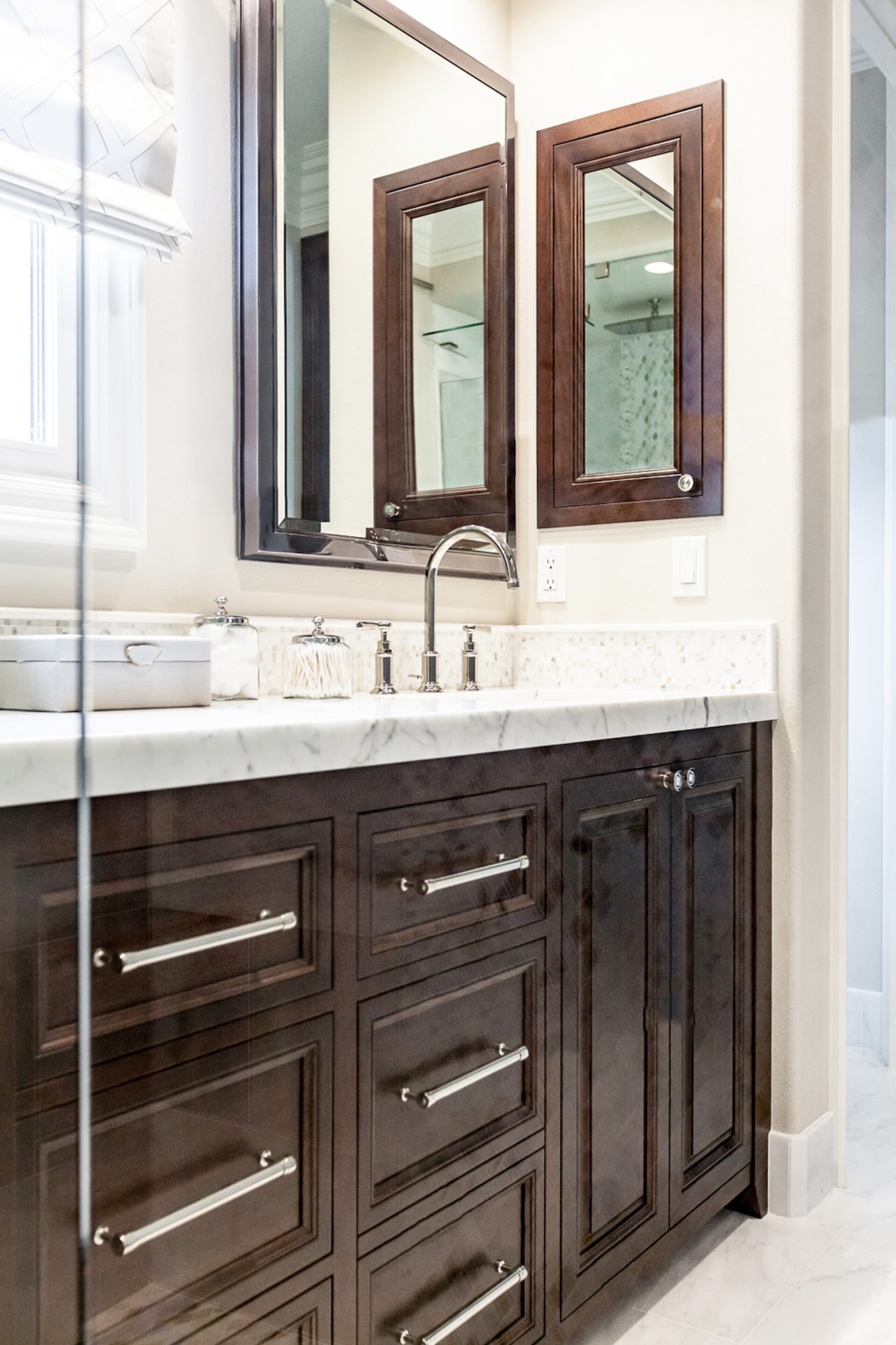 Dark Cabinetry White Countertops Bathroom Vanity