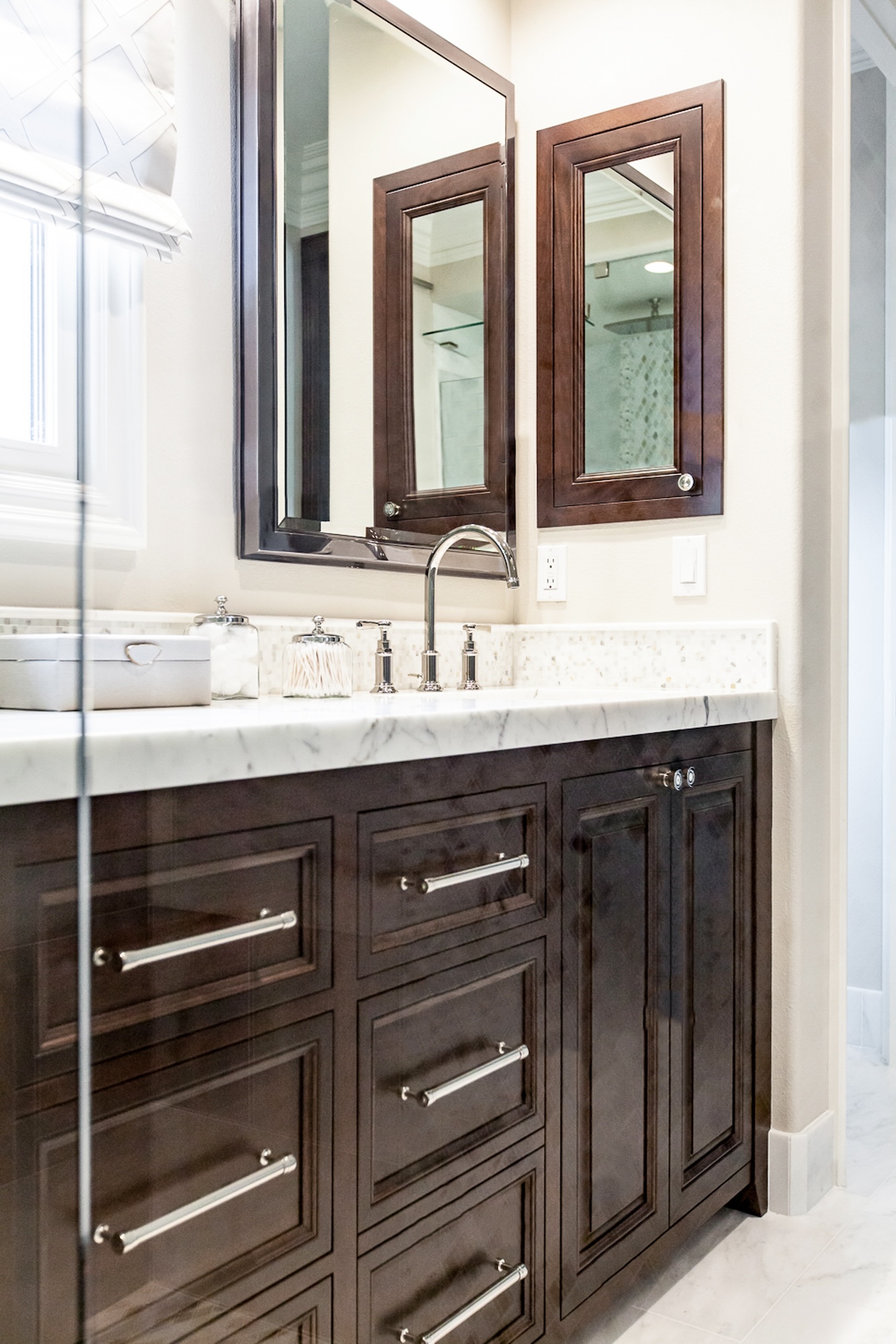 Dark Cabinetry White Countertops Bathroom Vanity