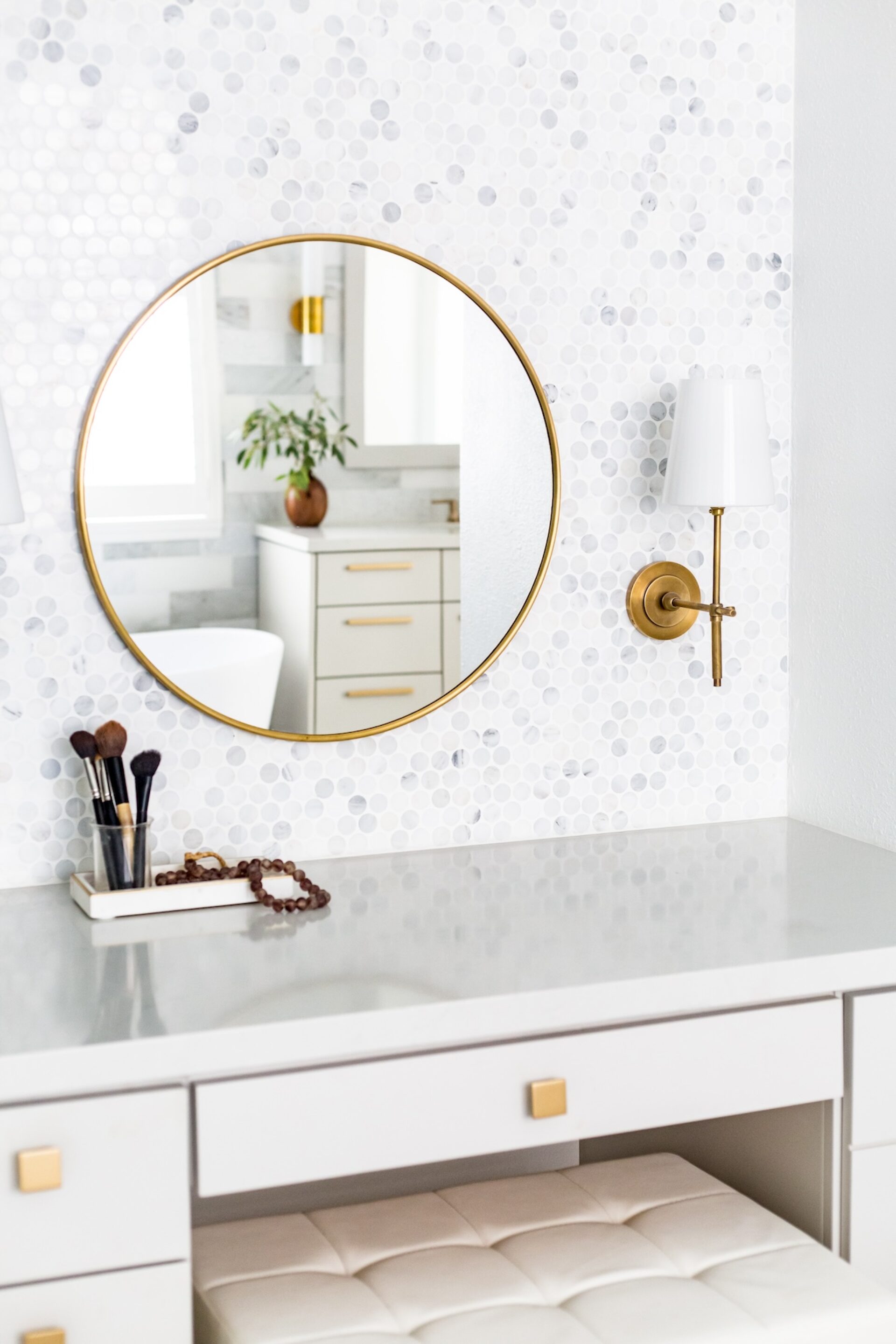 Round Mirror Over Makeup Vanity Counter